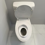 Tot Perch toddler toilet seat insert — quick-use method 2, resting on top of closed toilet seat